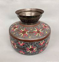 Full view of vase showing shape and enamel floral design