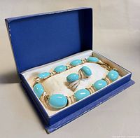 Necklace and earrings set in blue presentation box