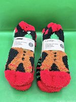 Front view of two labelled socks showing design and brand