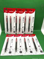 Front view of ten packaged Monami FX Zeta pens showing branding and 0.7 mm marking