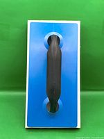 Top view showing handle and mounting plate