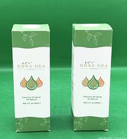 Front view of two boxed sprays