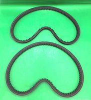 Both identical toothed belts laid flat to show shape and teeth