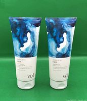 Front view of both Voir Rhythm of the Rain hair masque tubes