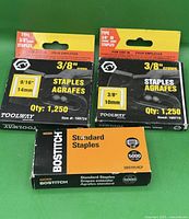 Three boxes of staples: two Toolway 3/8" crown staple packs (9/16" and 3/8") and one Bostitch standard staples box