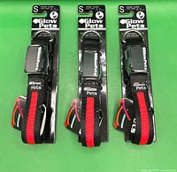Front view of three packaged GlowPets LED collars