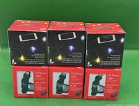Six boxed dual-tip Christmas light charge cables front view
