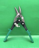 Front view of offset right-cut aviation snips, blades open