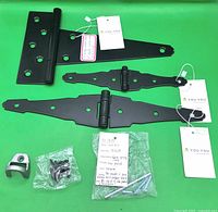 Overview of all gate hardware items on green background