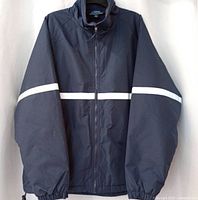 Front view of navy safety jacket with reflective stripe and zipper