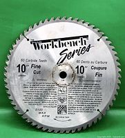 Front of 10" Workbench Series blade showing specs and carbide teeth