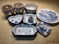 All nine porcelain pieces laid out