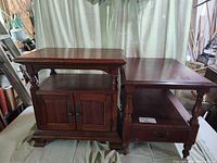 Both side tables, closed doors and drawer