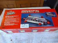 Boxed Vermont American industrial dovetail jig showing product image and specifications