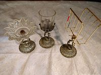 All three bathroom accessories side by side on tabletop