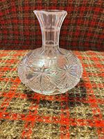 Full view of cut glass carafe showing overall form and pattern