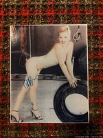 Front view of Drew Barrymore photograph showing full image and autograph