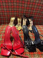 All four pairs of high-heel shoes arranged together