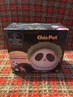 Front of boxed Jack Skellington Chia Pet decorative planter