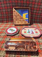 Overall lot with baskets, trays, cookie cutter, wall plaque