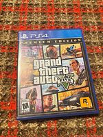 Front of PS4 case showing Grand Theft Auto V Premium Edition artwork