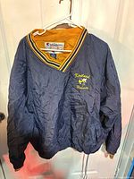 Front view of Champion Kirtland Hornets windbreaker jacket
