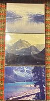 Three stacked 8x10 mountain landscape photos in sleeves