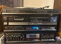 Stacked Fisher Studio Standard components: turntable, CD player, tuner, amplifier