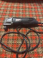 Full view of Warrior oscillating multi-tool with cord