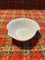 Top view of white bone china nautilus shell dish