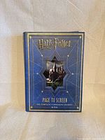 Front cover showing title and Hogwarts image