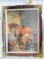 Full view of framed print with carved wood frame and glass