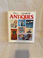 Front cover showing title and sample antique images