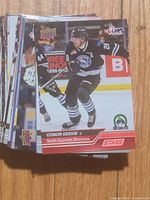 Front view of stack showing Conor Geekie card on top