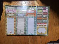 Front view of sealed Lily Ashbury stationery set showing monthly pads and sticky notes