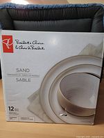 Front of boxed President's Choice Sand dinnerware set