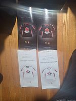 Front view of all four sealed mini-jersey packages