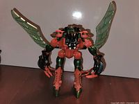 Front view, robot mode showing wings and colors