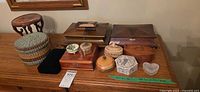 Overview of all jewelry and trinket boxes arranged on dresser