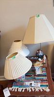 All three lamps and Bulova clock on side table