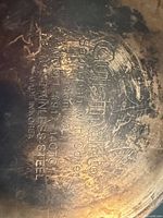 Bottom stamp of Cuisinart stainless sauté pan