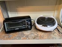 Both appliances side by side on countertop