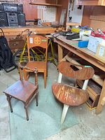All three chairs grouped in workshop