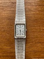 Full view of the Seiko ladies watch showing dial and textured bracelet