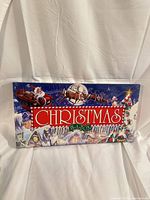 Front view of sealed Christmas In-A-Box board game
