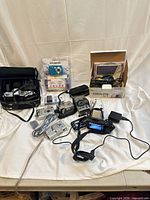 Group shot showing all cameras, bag, boxes, accessories