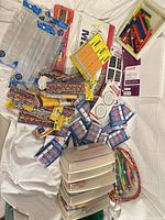 overview of mixed school supplies on cloth background