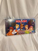 Front view of factory-sealed Scooby-Doo Fright Fest Edition Monopoly box