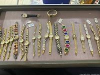 Full tray showing all 18 watches laid out