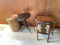 overall view of basket, round table, rectangular table, chair